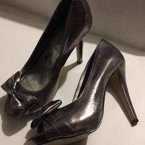 Silver bow heels
